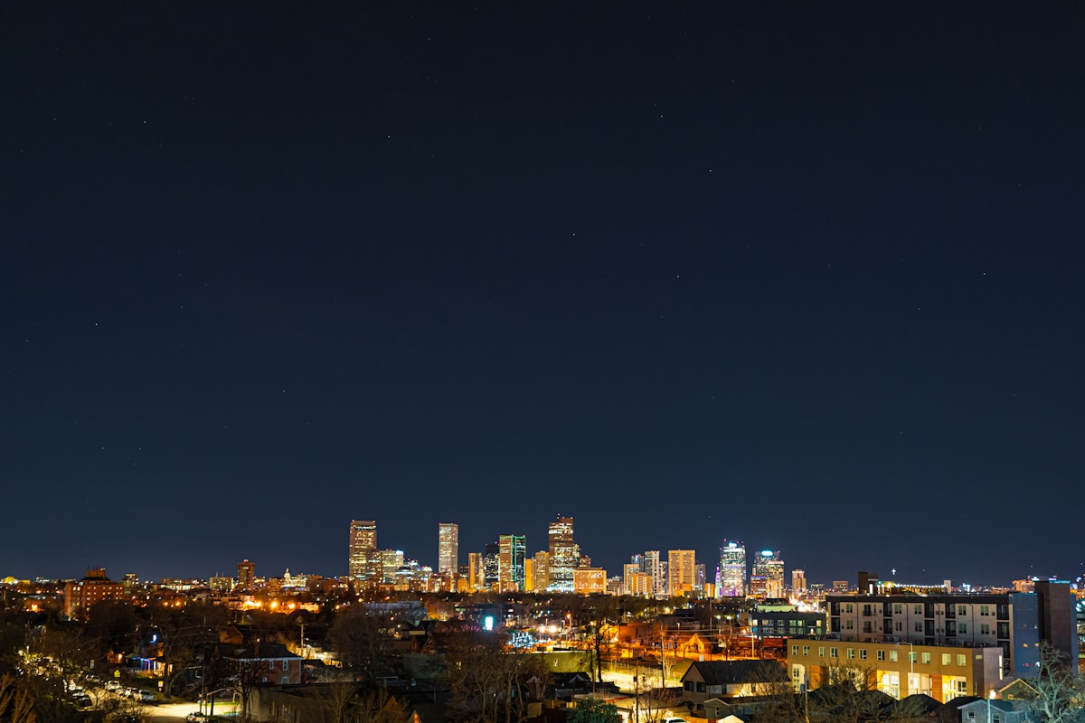 Denver skyline at dusk — DenverFirm attorneys